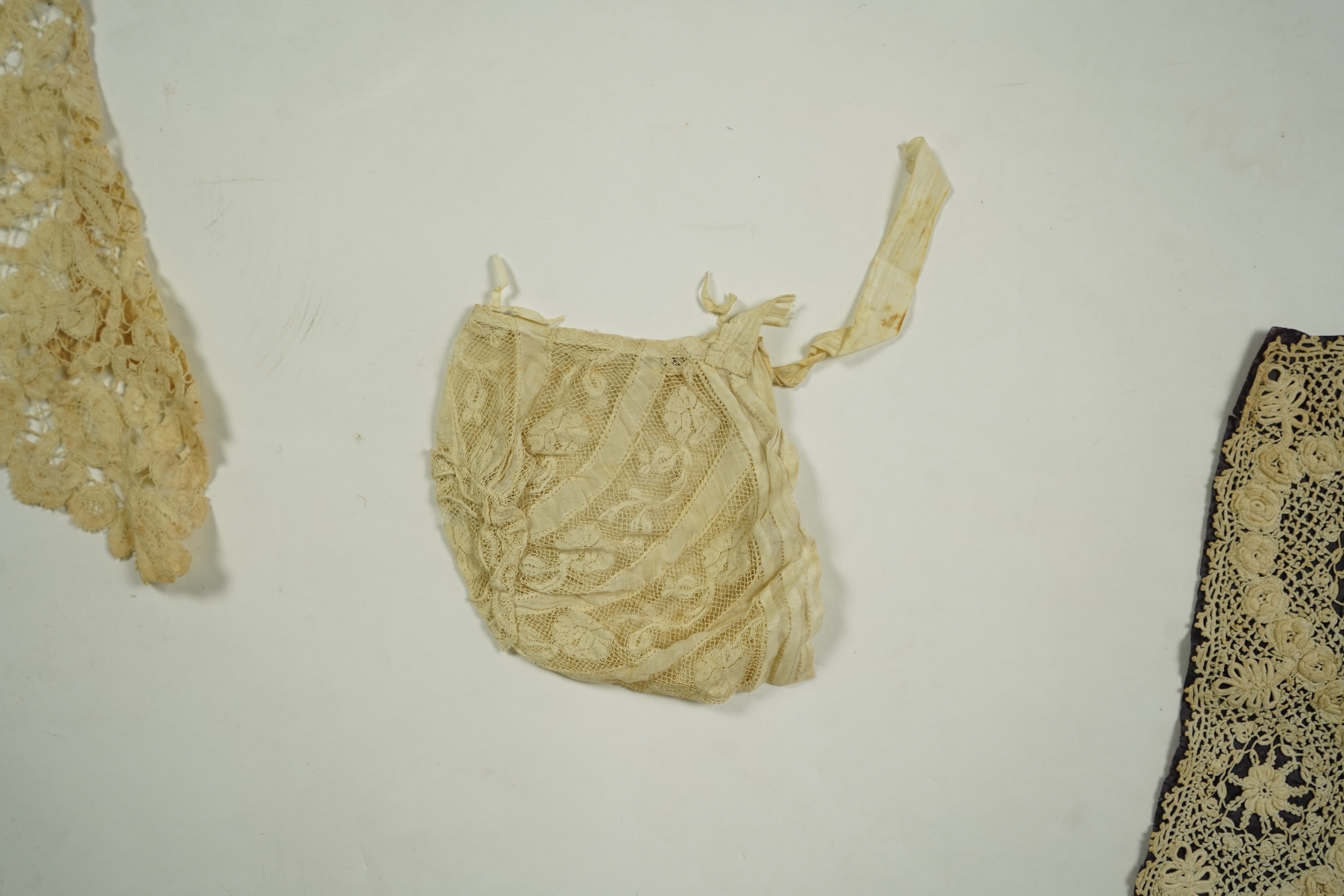A mixed Brussels bobbin lace and Point de Gaze lace collar, another smaller collar, a similar length of trim and butterfly motif, together with a Brussels bobbin collar and trim, an Irish crochet cuffs, a Valenciennes la